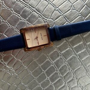 Anne  Klein gold ,and blue leather band water resistant,gold face new